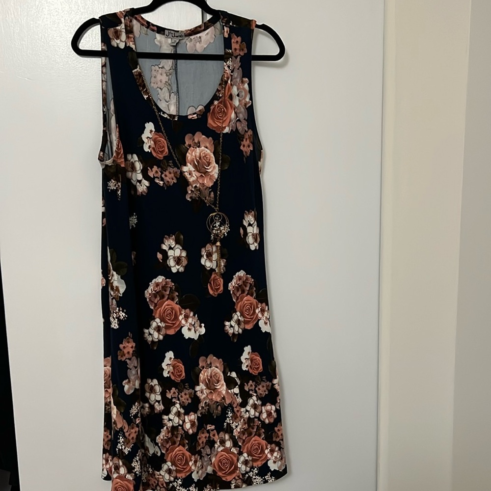 A floral dress with necklace.
